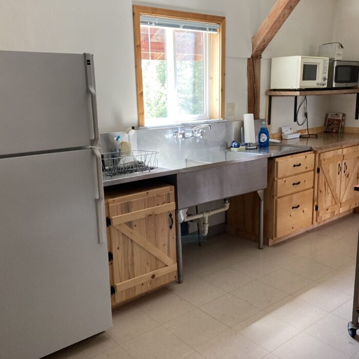 refrigerator, sink and microwaves