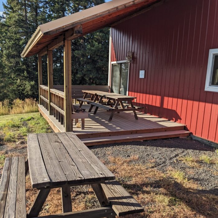 the barn's deck offers outdoor seating